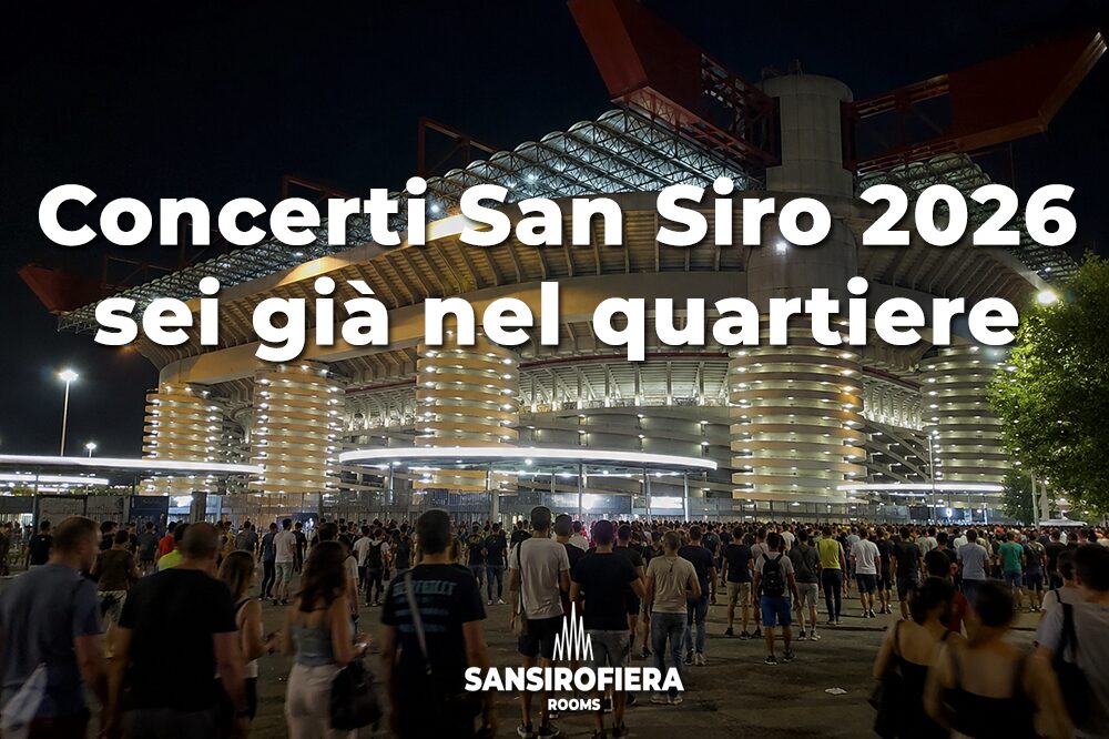 Folla in arrivo allo Stadio San Siro di Milano per un concerto estivo notturno